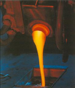 Raw materials for glass are melted in a rotary furnace and poured into water